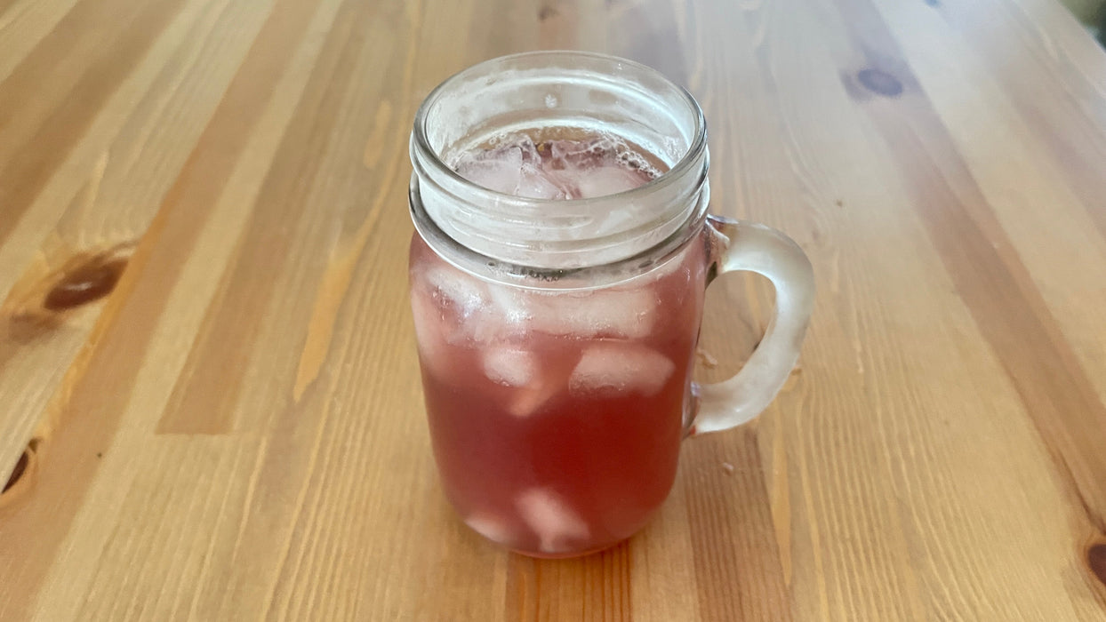 tonic on table with ice in cup
