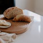 bread and butter on cutting board