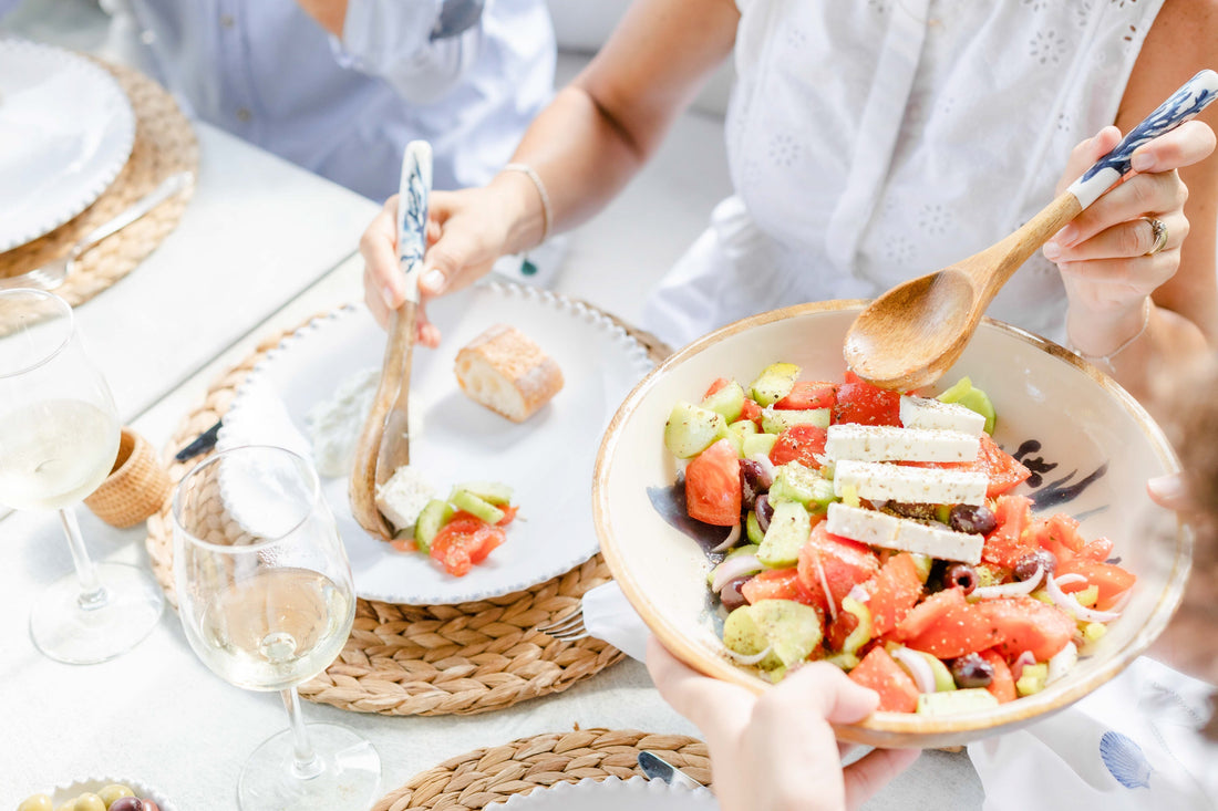dipping a salad of healthy foods